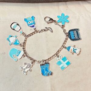 Stainless Steel Figaro Charm Bracelet with Several Winter Themed Charms Handmade